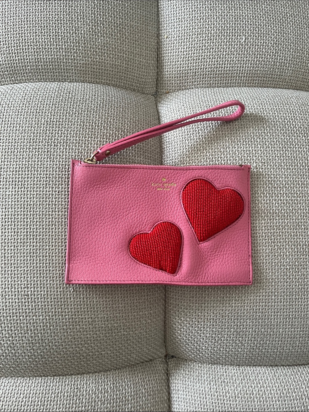 kate spade Pink Wristlet Clutch with Red Heart Accents